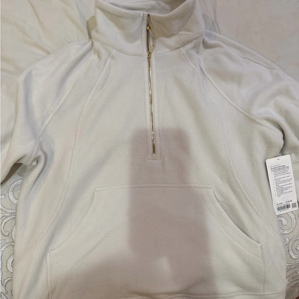 Scuba Tumbled Fleece Funnel-
Neck Half Zip
Colour Bone/Gold
Size XL/XXL - Picture 7 of 10